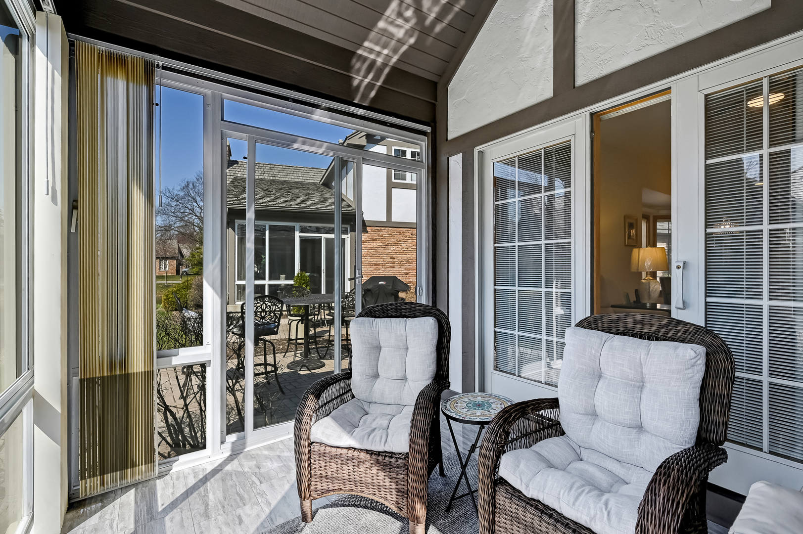 61 Berkshire Court Burr Ridge, IL 60527 - Photo 17 of 47 a view of a porch with chairs and couches
