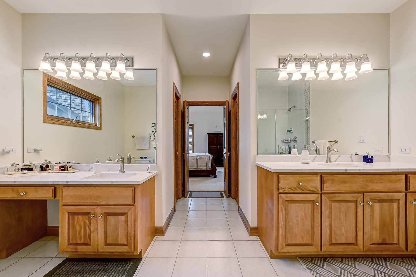 61 Berkshire Court Burr Ridge, IL 60527 - Photo 21 of 47 a spacious bathroom with a double vanity sink and a mirror