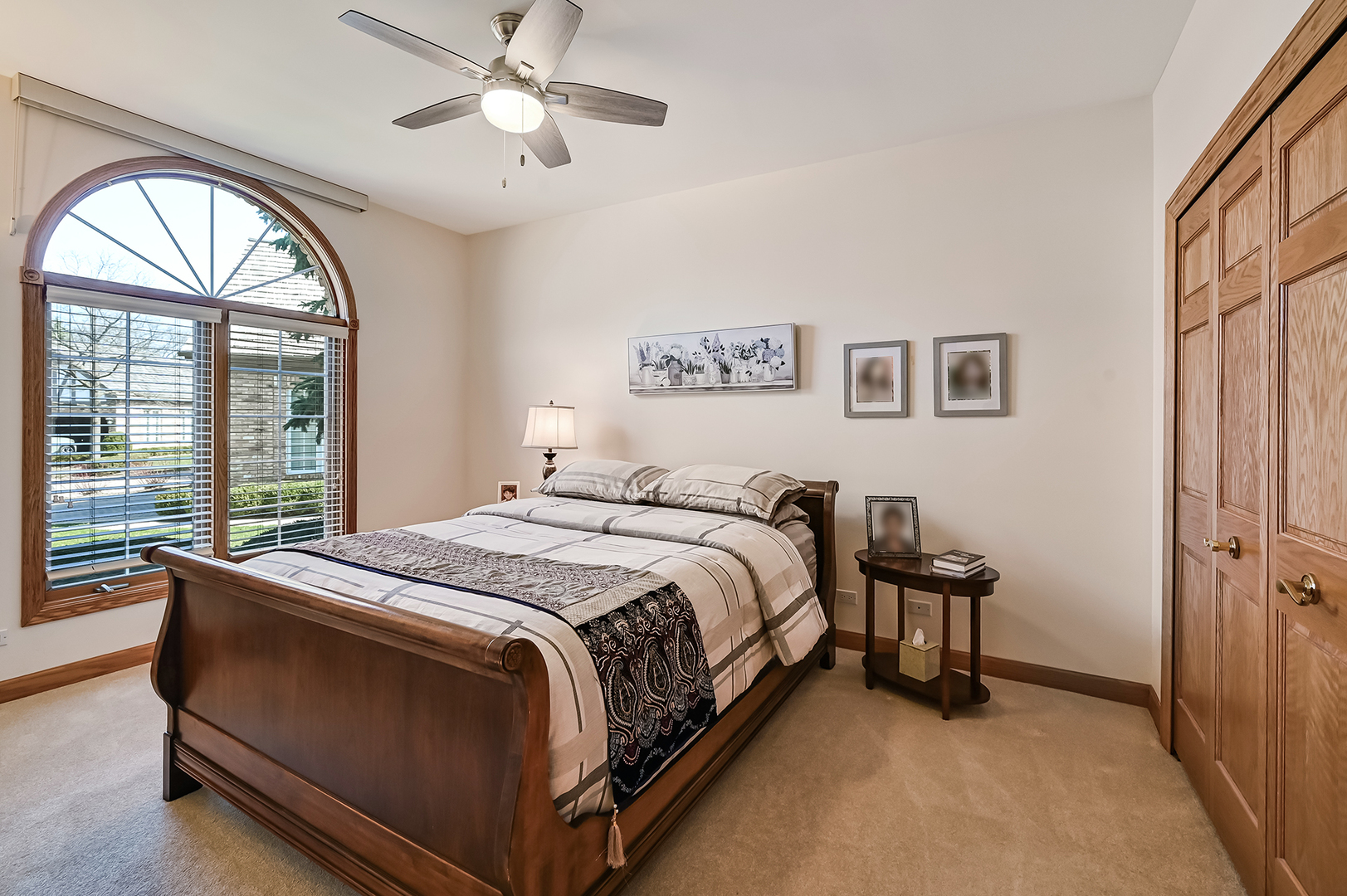 61 Berkshire Court Burr Ridge, IL 60527 - Photo 22 of 47 a bed room with a bed and a chandelier