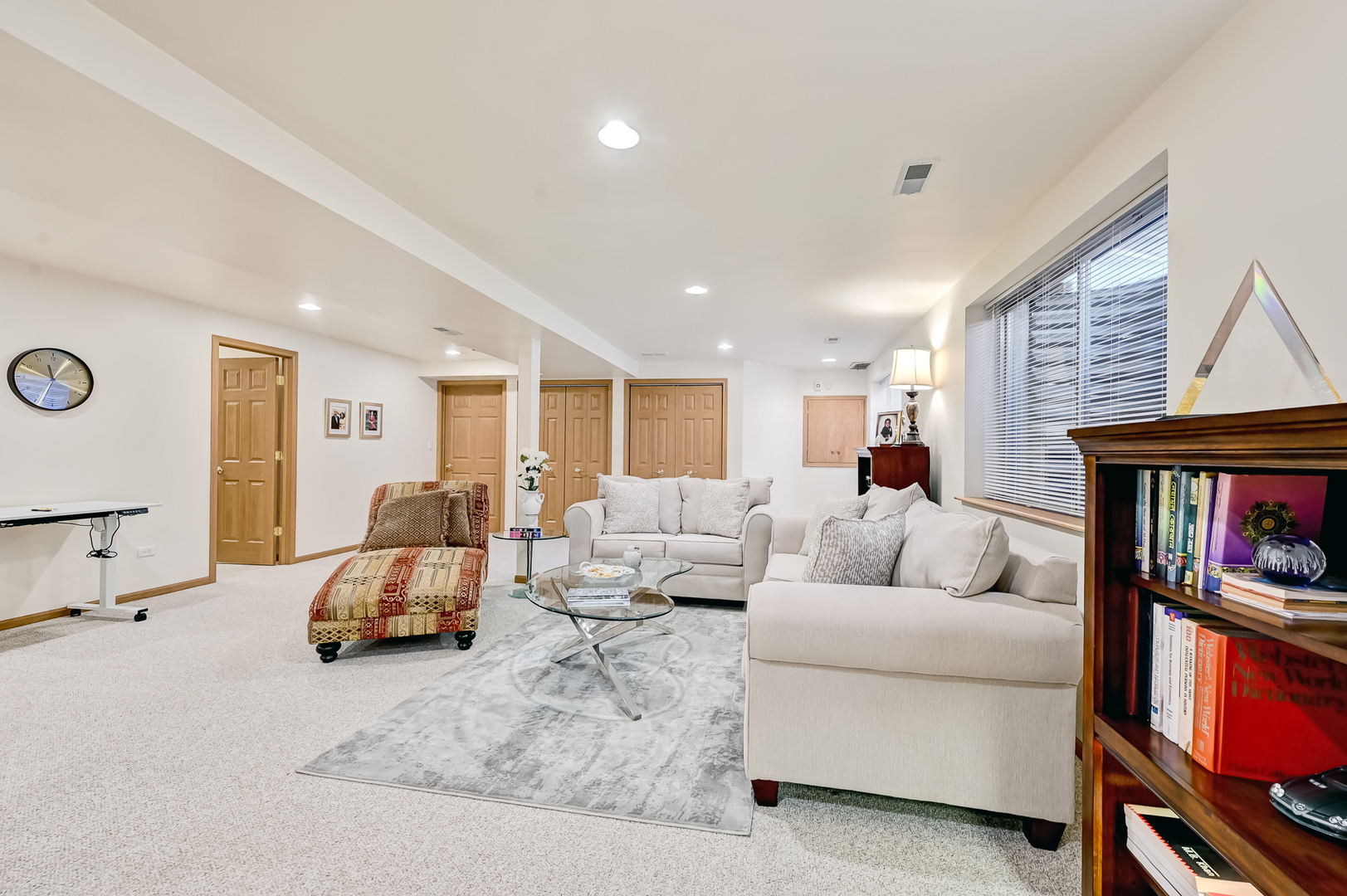 61 Berkshire Court Burr Ridge, IL 60527 - Photo 26 of 47 a living room with furniture and a couch