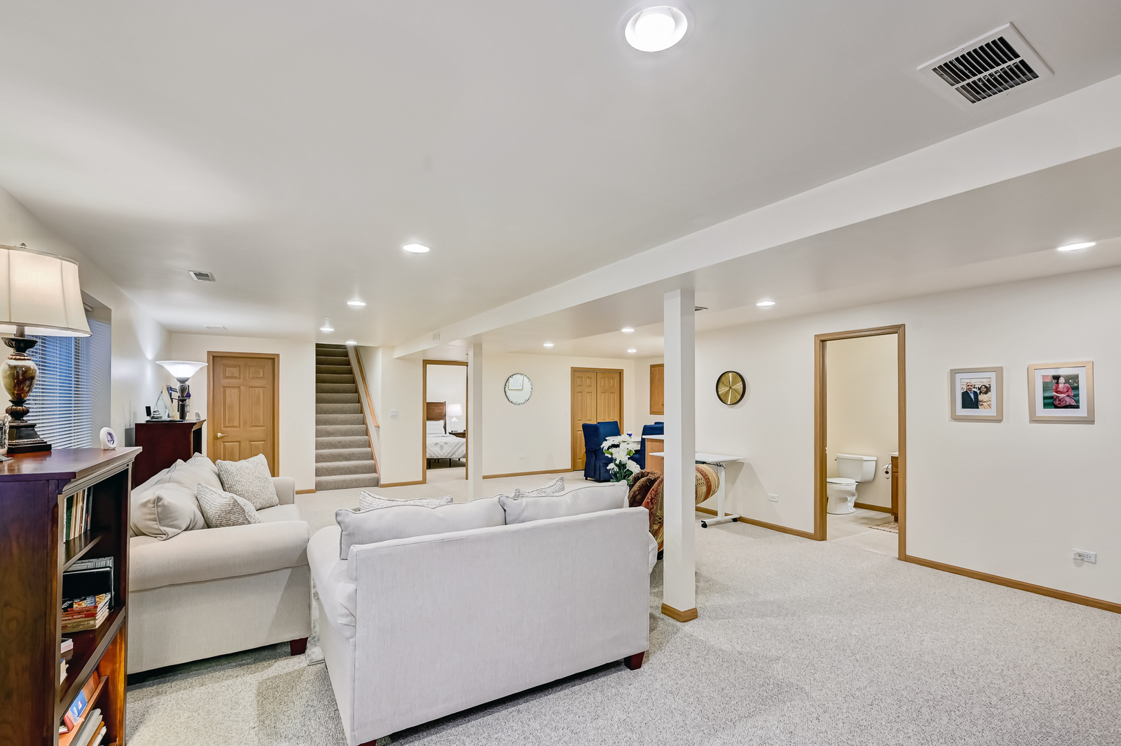 61 Berkshire Court Burr Ridge, IL 60527 - Photo 31 of 47 a living room with furniture and a large window