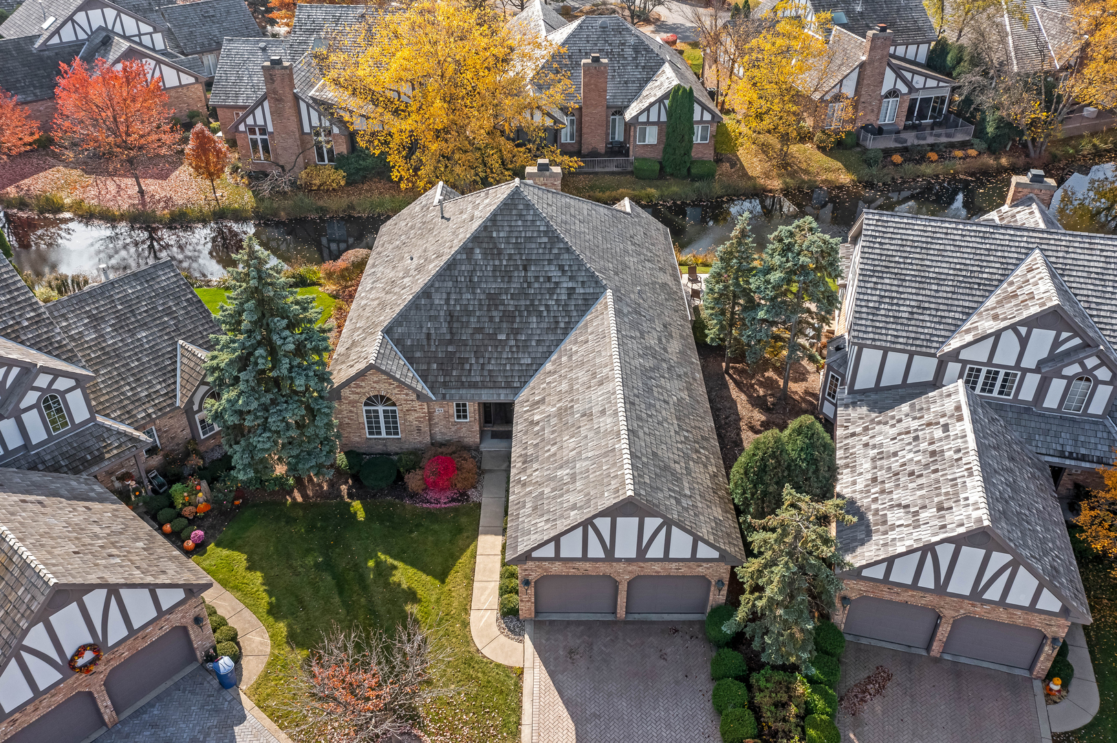 61 Berkshire Court Burr Ridge, IL 60527 - Photo 42 of 47 a front view of a house with outdoor seating