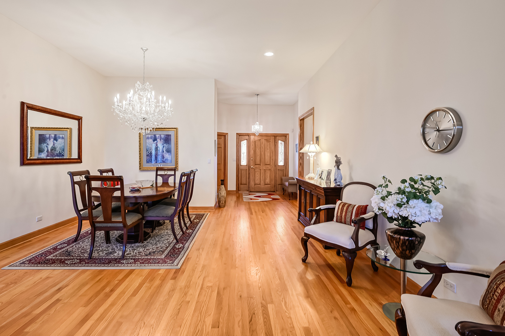 61 Berkshire Court Burr Ridge, IL 60527 - Photo 8 of 47 a view of a dining room with furniture and wooden floor