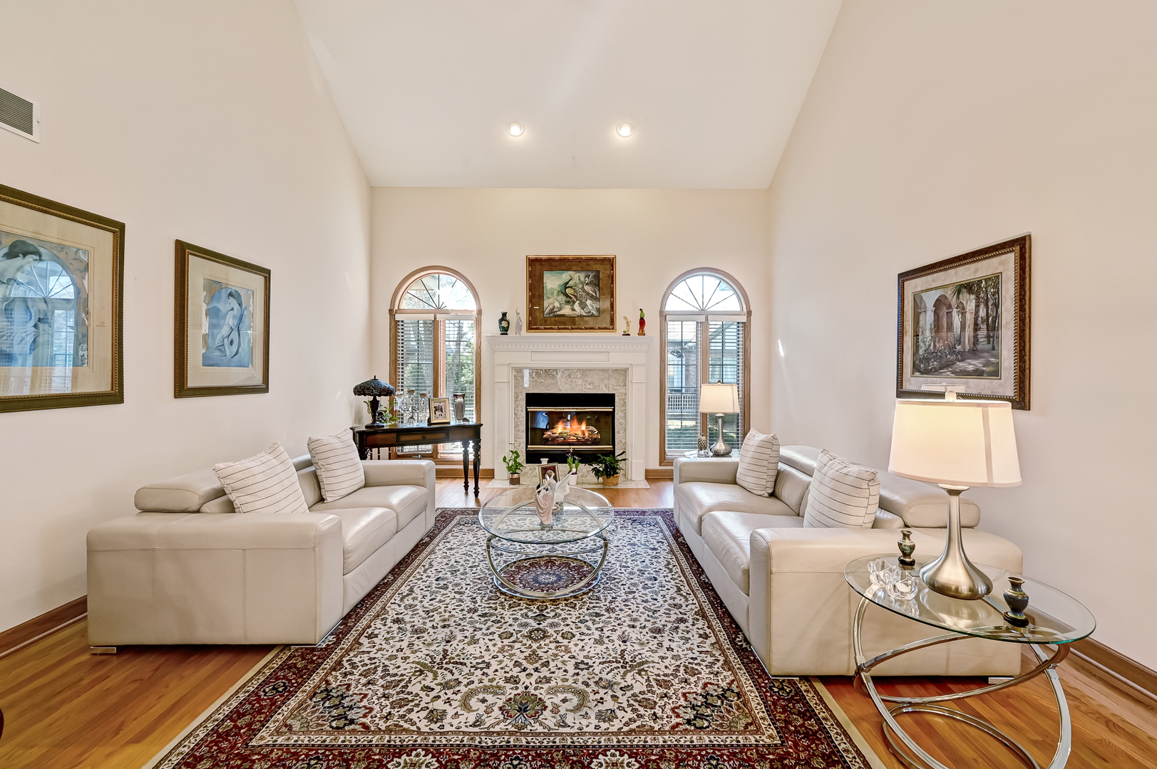 61 Berkshire Court Burr Ridge, IL 60527 - Photo 9 of 47 a living room with furniture and a fireplace