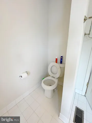 a bathroom with a toilet and a sink