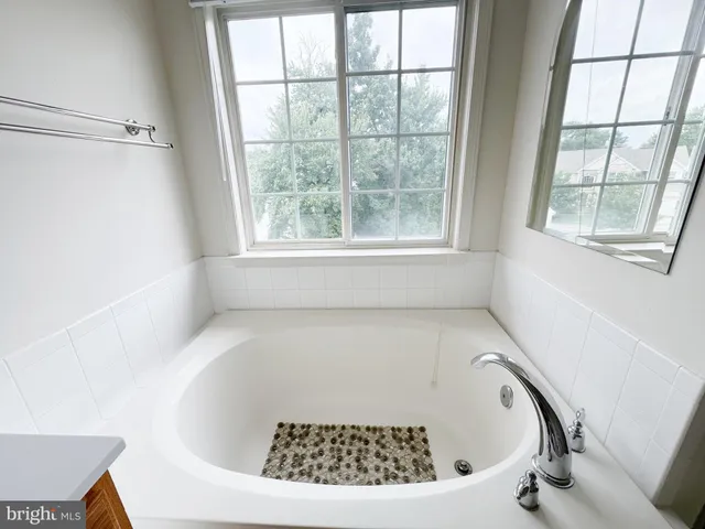 a bathroom with a bathtub