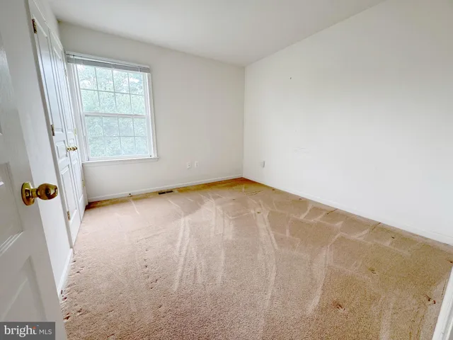 a view of a room with windows