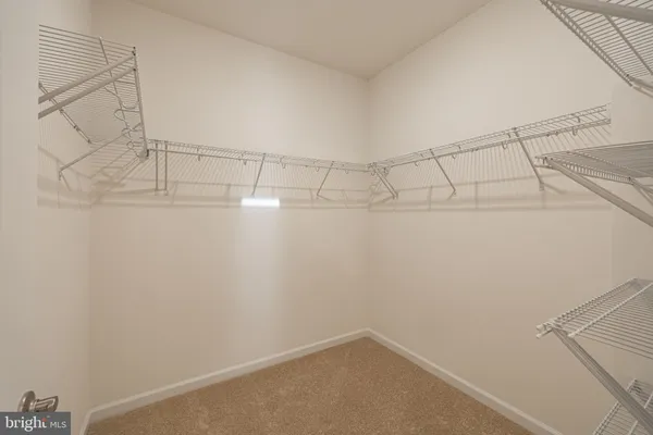 a view of a room with racks on the wall