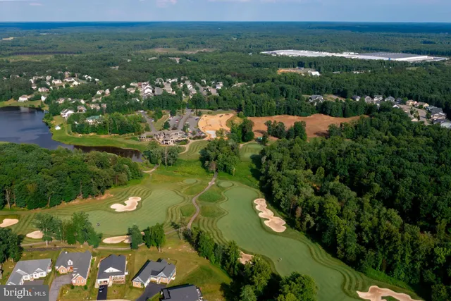 a view of a lake with a city