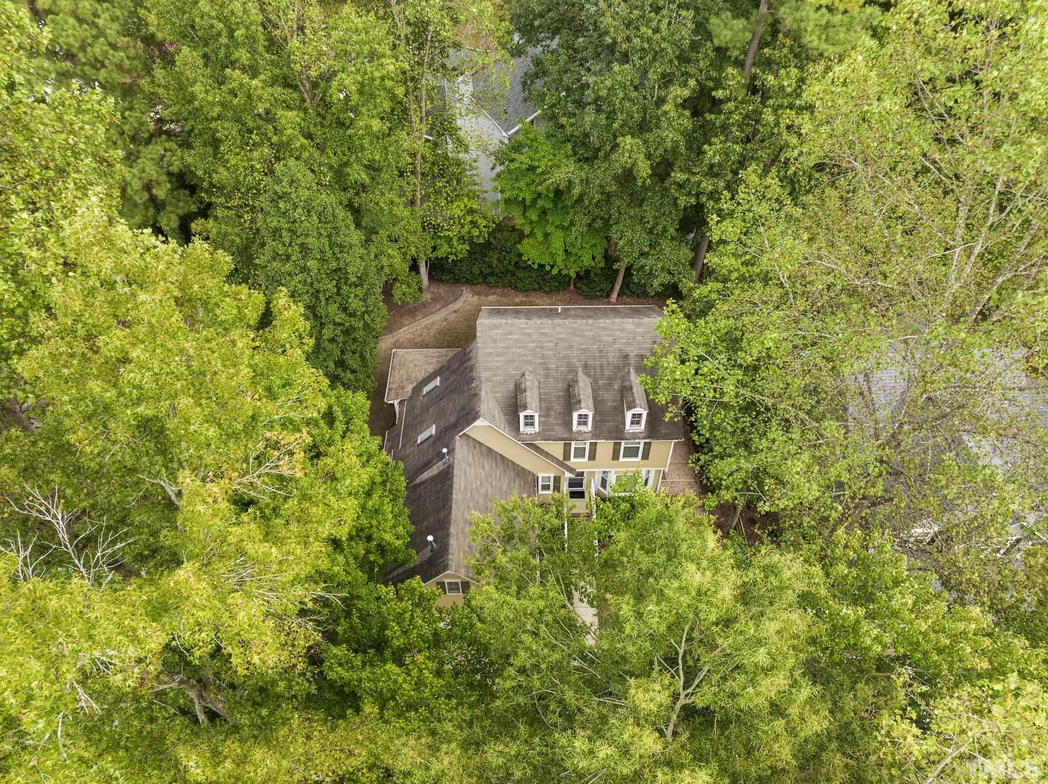 12028 North Exeter Way Raleigh, NC 27613 - Photo 46 of 48 an aerial view of a house with a yard