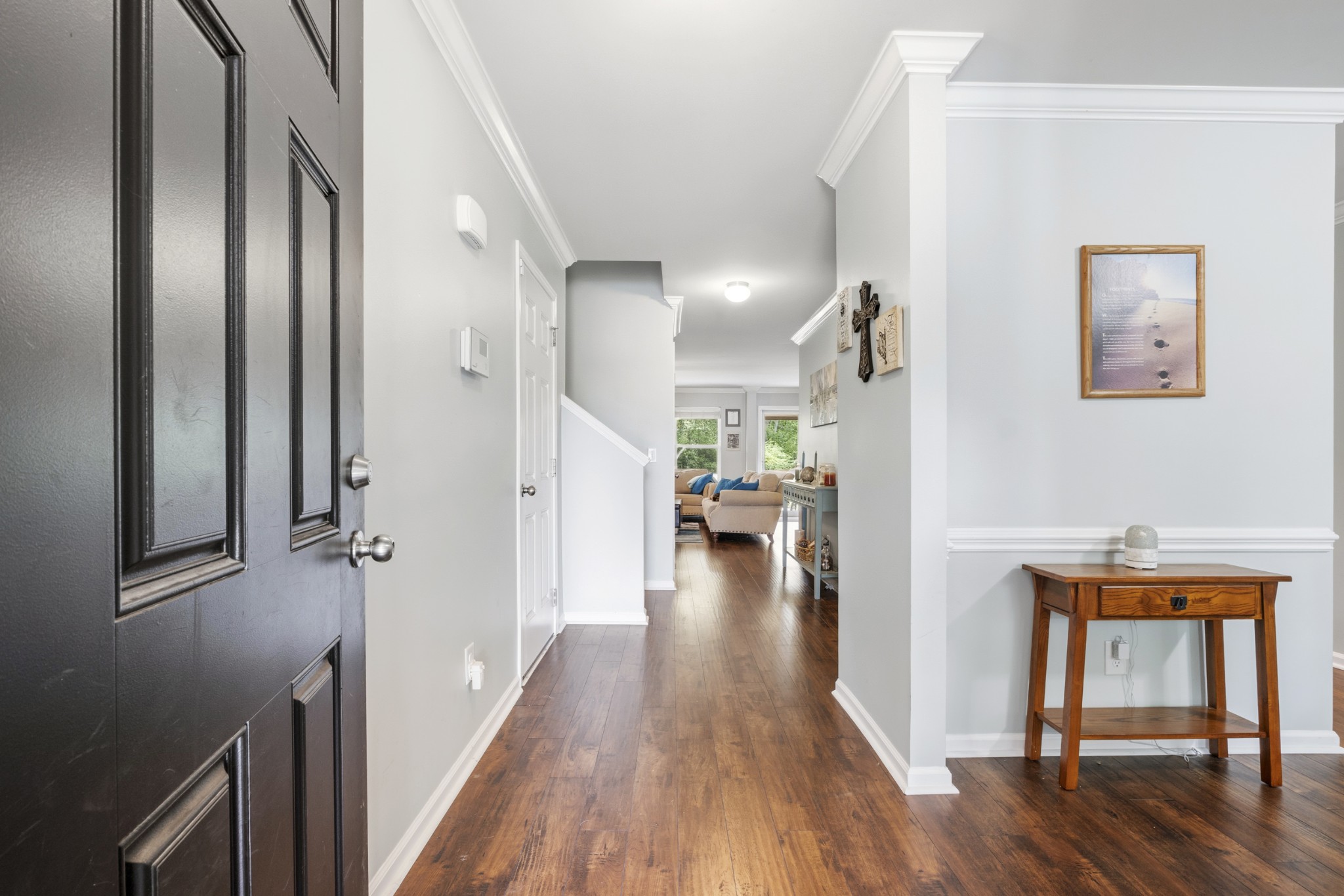 1011 Benwick Road Hendersonville, TN 37075 - Photo 10 of 60 a view of a hallway view with wooden floor and staircase