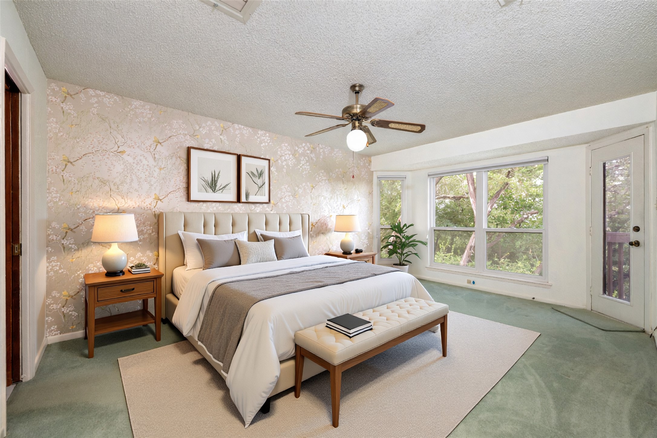 5319 Musket Ridge Austin, TX 78759 - Photo 19 of 39 A spacious sleeping sanctuary with private balcony access and an enchanting wooded view.