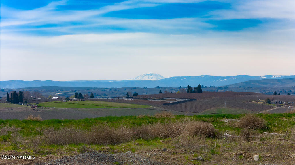 1520 Valhalla Loop Selah, WA 98942 - Photo 8 of 11 a view of lake with mountain in the background
