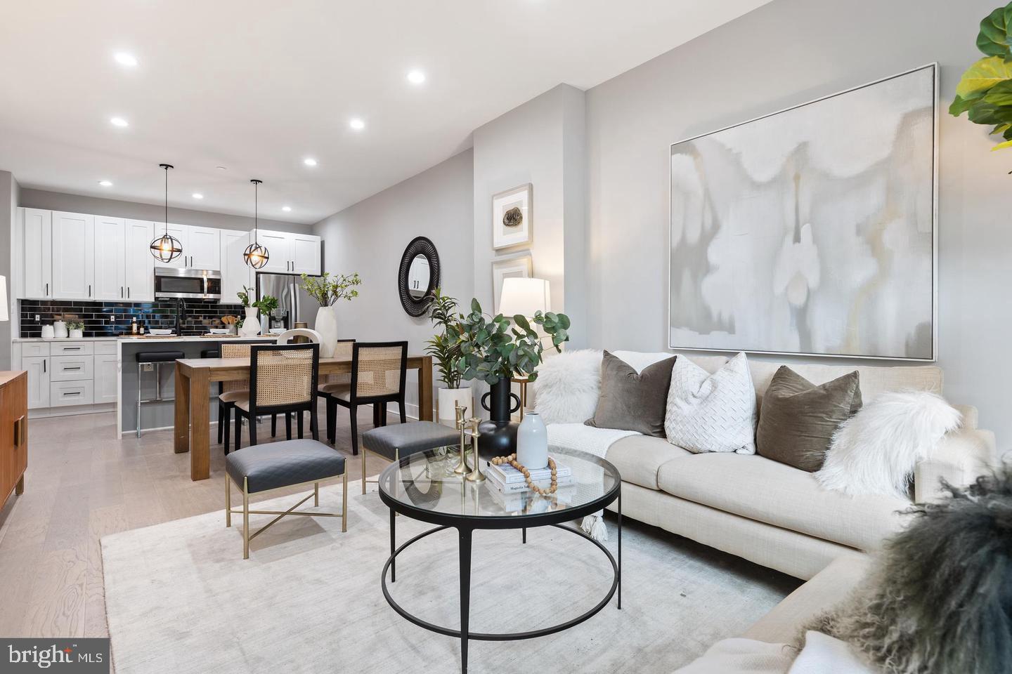 213 Bates Street Northwest, Unit 1 Washington, DC 20001 - Photo 8 of 28 a living room with furniture kitchen and a table
