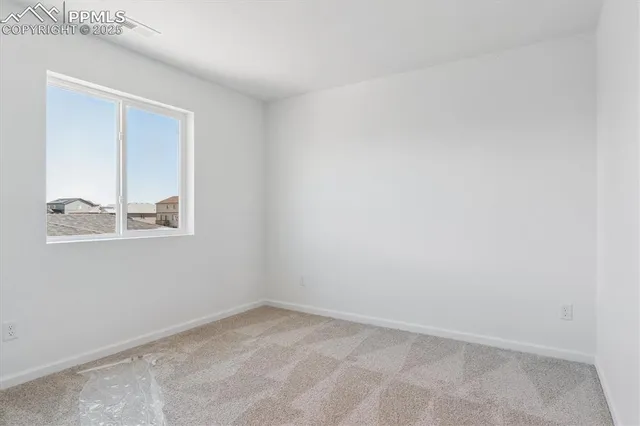 an empty room with a window