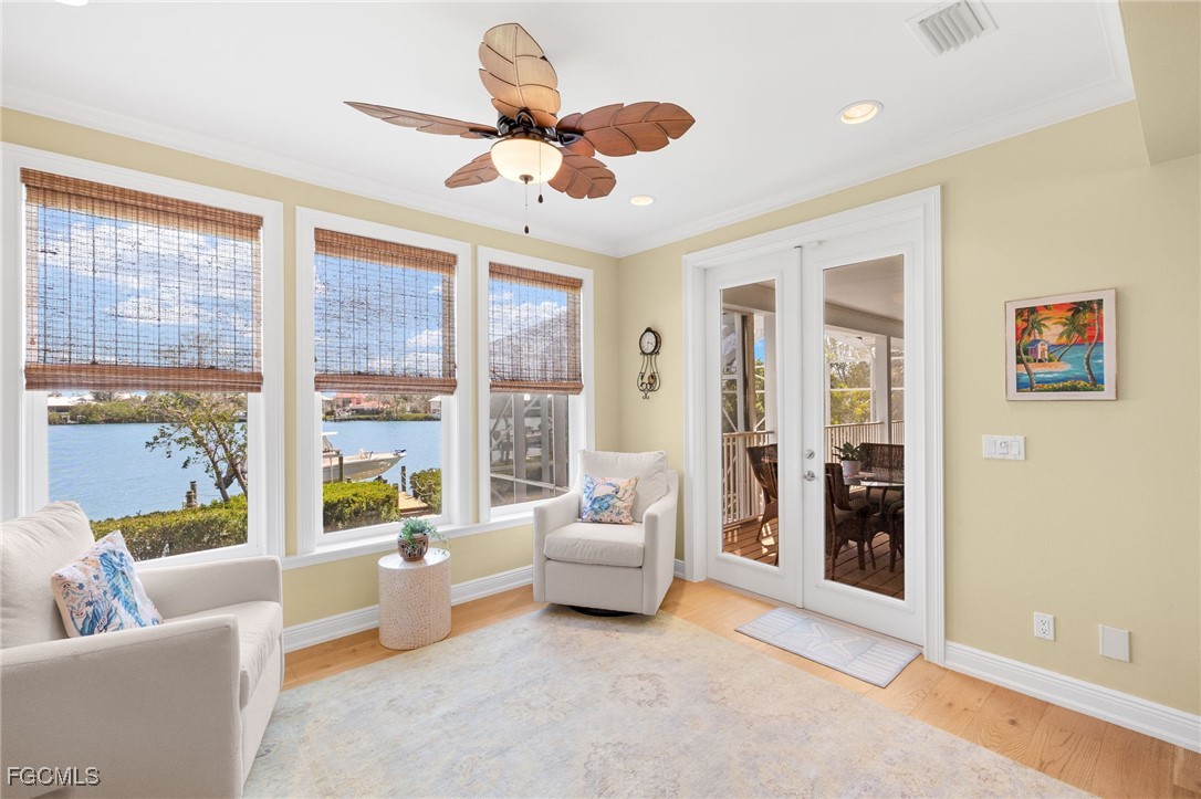 2391 Shop Road Sanibel, FL 33957 - Photo 13 of 50 a living room with furniture and a large window