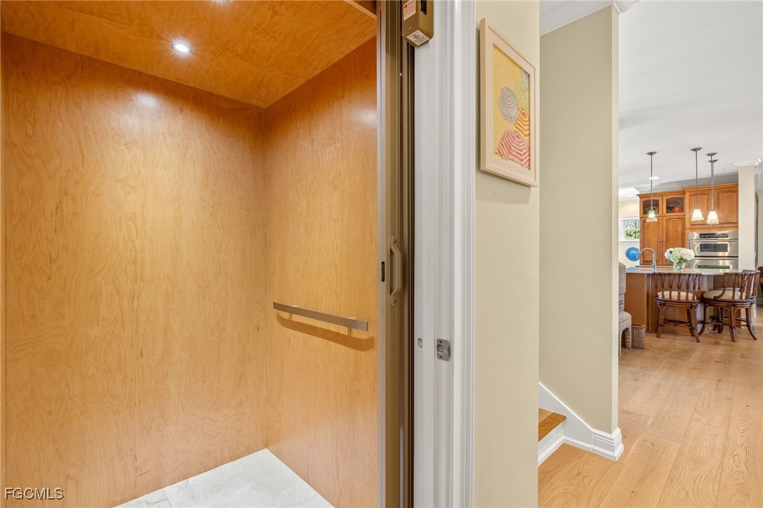2391 Shop Road Sanibel, FL 33957 - Photo 22 of 50 a view of elevator with a hallway