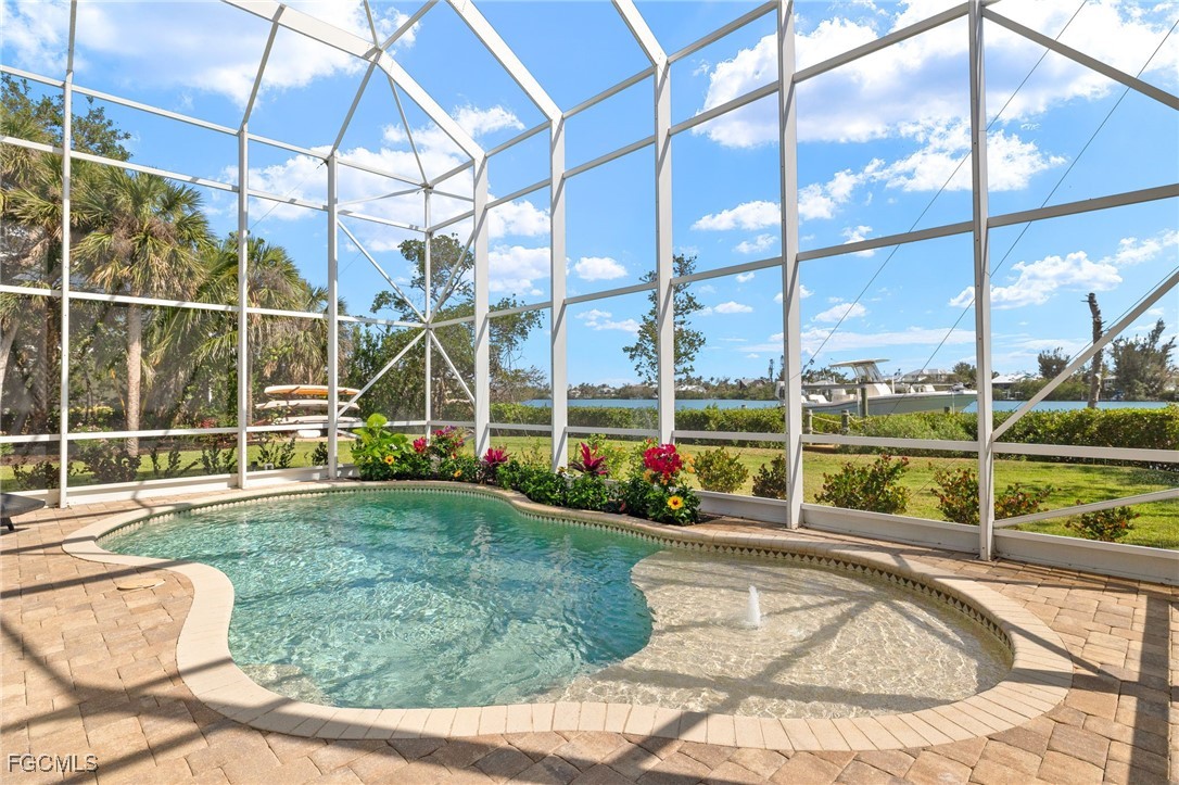 2391 Shop Road Sanibel, FL 33957 - Photo 36 of 50 a view of swimming pool with outdoor seating