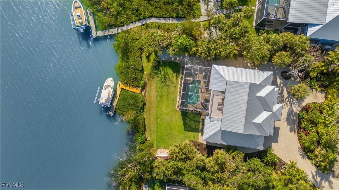 2391 Shop Road Sanibel, FL 33957 - Photo 49 of 50 an aerial view of a house with a yard basket ball court and outdoor seating