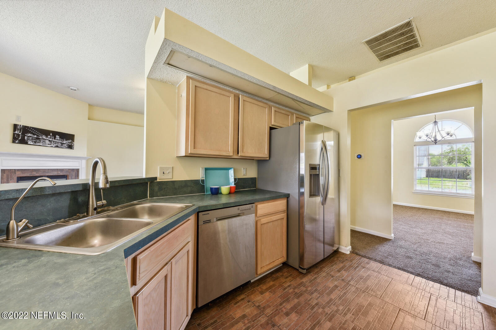 470 Federal Hill Road Orange Park, FL 32073 - Photo 15 of 26 a kitchen that has a sink cabinets counter space and appliances