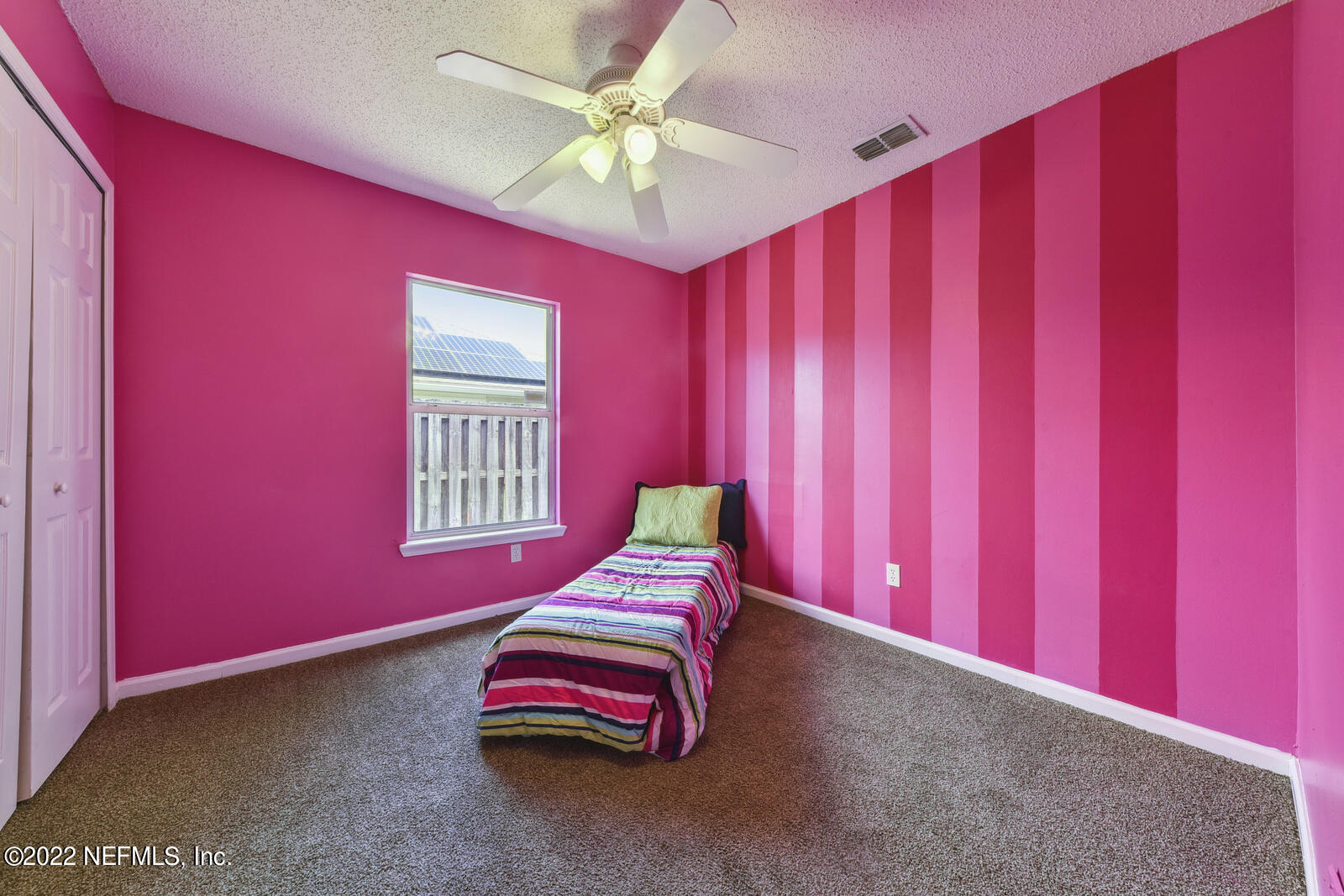 470 Federal Hill Road Orange Park, FL 32073 - Photo 23 of 26 a bedroom with a bed and a window