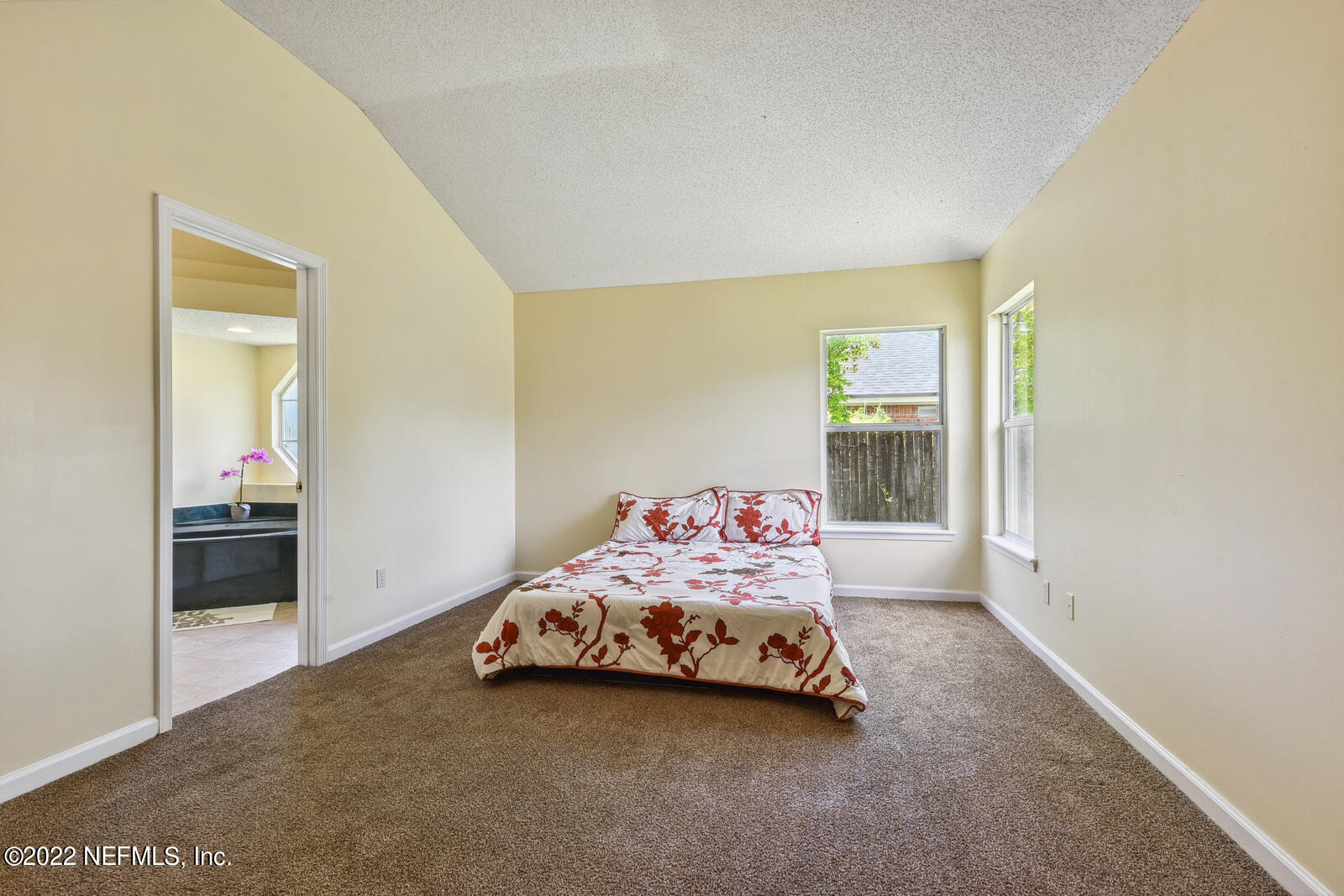 470 Federal Hill Road Orange Park, FL 32073 - Photo 5 of 26 a bedroom with a bed and a cabinets