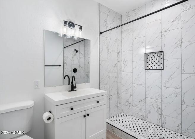 4202 North 10th Street, Unit 6 Phoenix, AZ 85014 - Photo 12 of 18 a bathroom with a sink a toilet and shower