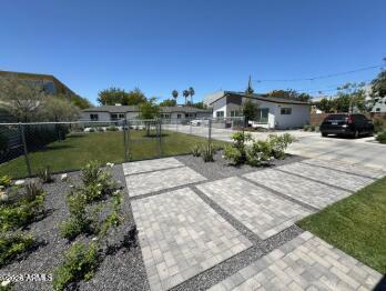 4202 North 10th Street, Unit 6 Phoenix, AZ 85014 - Photo 14 of 18 a view of a lake with a building in front of it