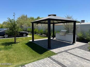 4202 North 10th Street, Unit 6 Phoenix, AZ 85014 - Photo 15 of 18 a view of a porch with a backyard