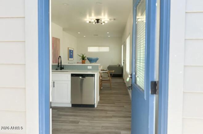 4202 North 10th Street, Unit 6 Phoenix, AZ 85014 - Photo 2 of 18 a view of a kitchen from the hallway