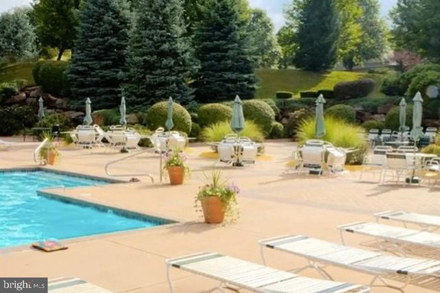 a view of backyard of a house