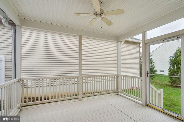 a view of a livingroom with a balcony
