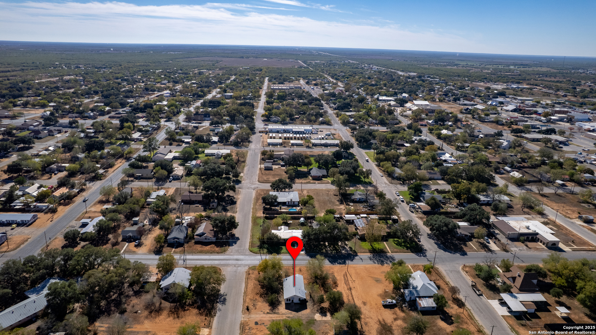 719 East Trinity Street Pearsall, TX 78061 - Photo 11 of 26 an aerial view of multiple house