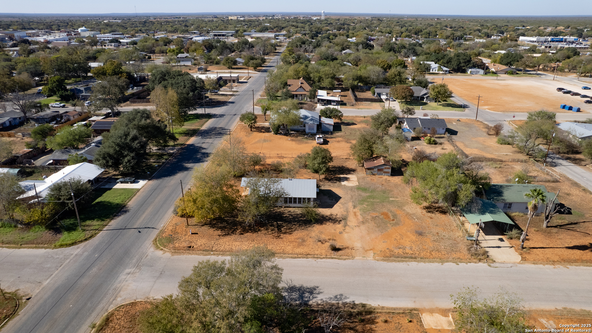 719 East Trinity Street Pearsall, TX 78061 - Photo 9 of 26 an aerial view of a city