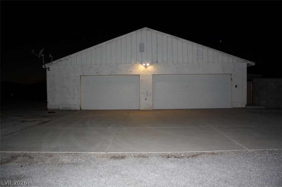 1101 East Blosser Ranch Road Pahrump, NV 89060 - Photo 31 of 50 View of garage at night