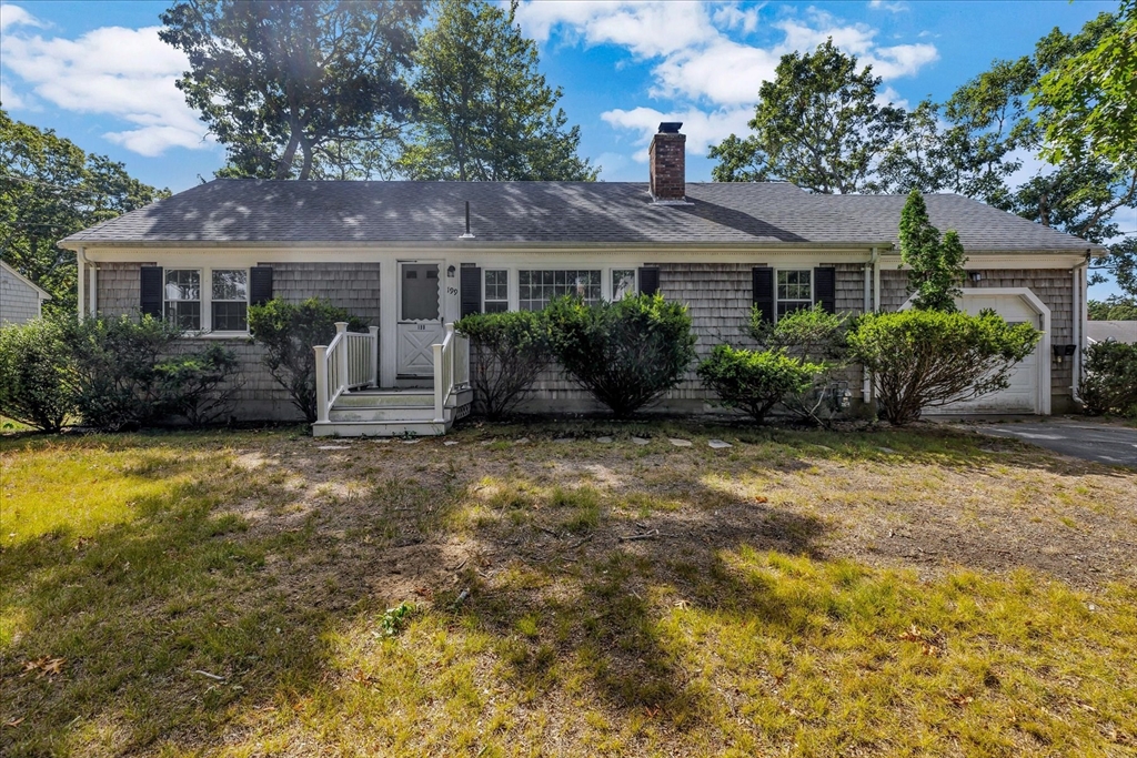 199 Hamden Circle Barnstable, MA 02601 - Photo 1 of 13 a front view of a house with garden