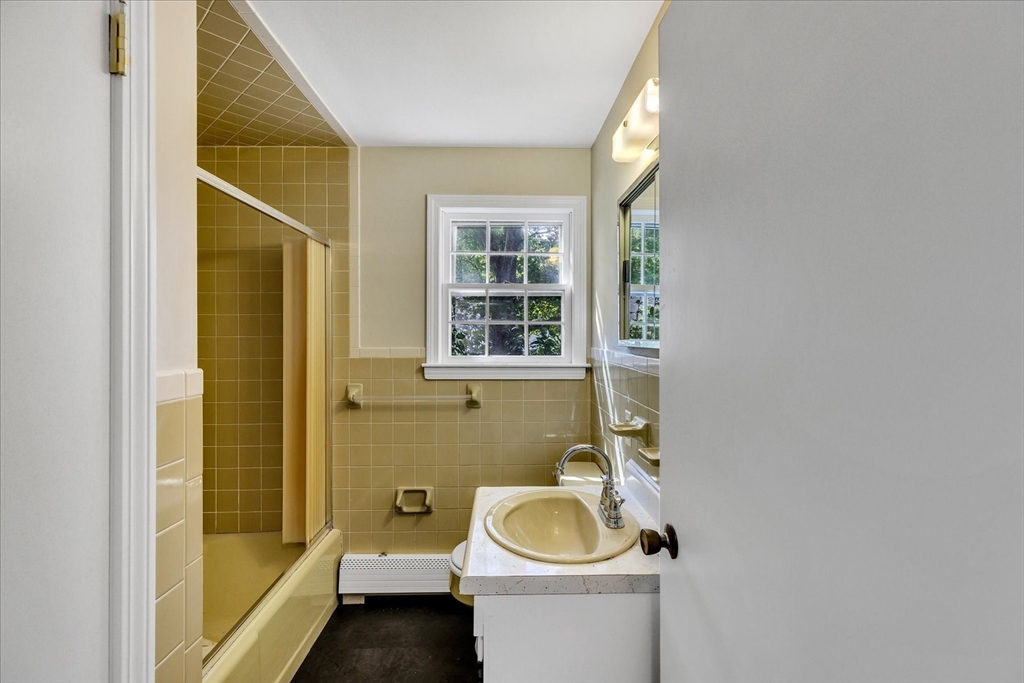 199 Hamden Circle Barnstable, MA 02601 - Photo 10 of 13 a bathroom with a sink and a tub