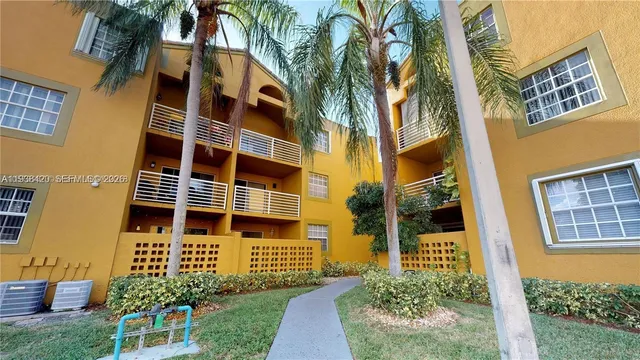 a bathroom with a sink a mirror and a shower