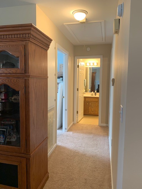 506 Sheath Circle Lebanon, TN 37087 - Photo 12 of 19 a view of a hallway with wooden floor and a fireplace