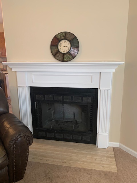 506 Sheath Circle Lebanon, TN 37087 - Photo 7 of 19 a living room with a fireplace and a wooden floor