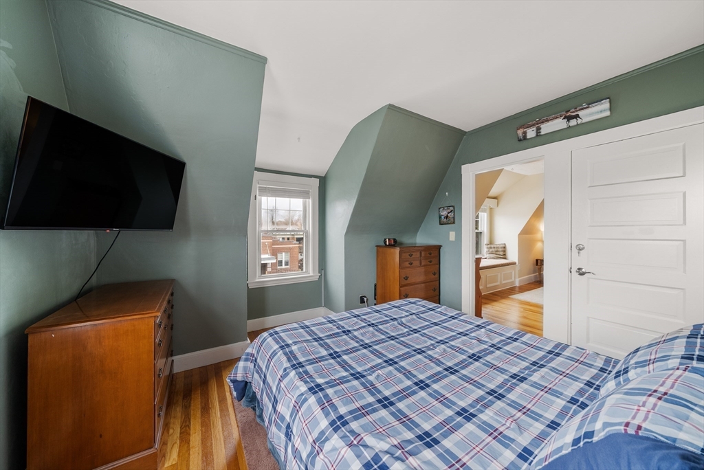 4 Alden Street, Unit 3 Danvers, MA 01923 - Photo 18 of 33 a bedroom with a bed and a flat screen tv