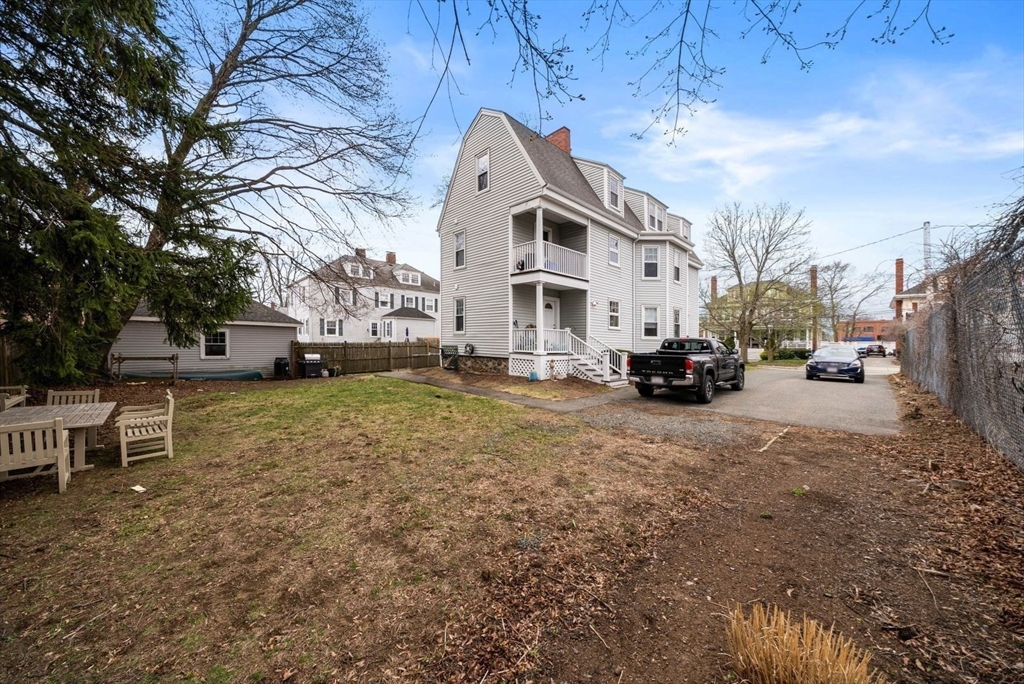 4 Alden Street, Unit 3 Danvers, MA 01923 - Photo 29 of 33 a view of a house with a yard