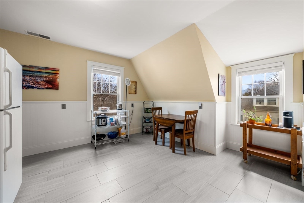 4 Alden Street, Unit 3 Danvers, MA 01923 - Photo 10 of 33 a view of a livingroom with furniture and a window
