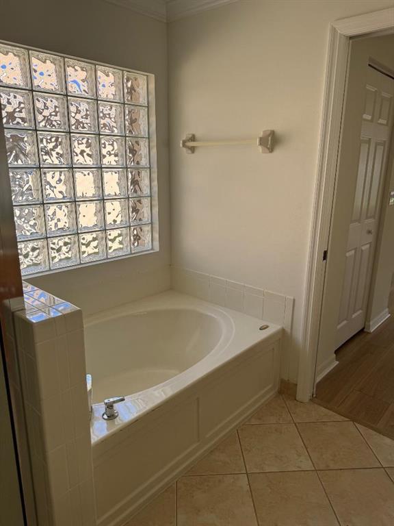 12082 Roma Road Boynton Beach, FL 33437 - Photo 11 of 14 a bath tub sitting next to a window