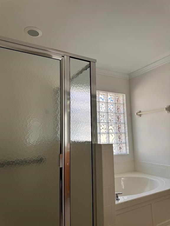 12082 Roma Road Boynton Beach, FL 33437 - Photo 10 of 14 a bathroom with a bathtub and a shower