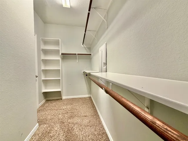 a view of a walk in closet