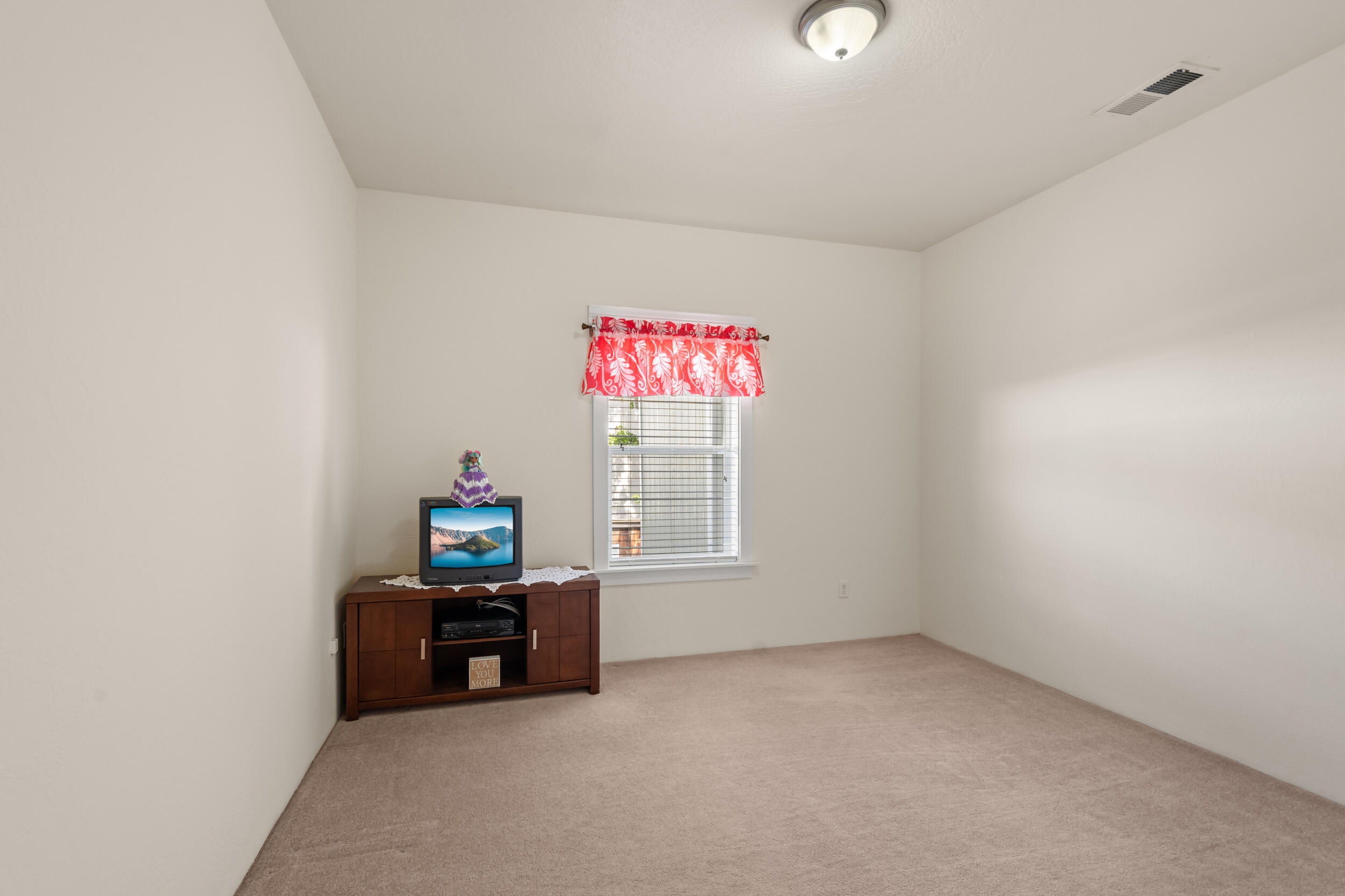 1227 Lithia Way Talent, OR 97540 - Photo 26 of 37 a view of an empty room with a window