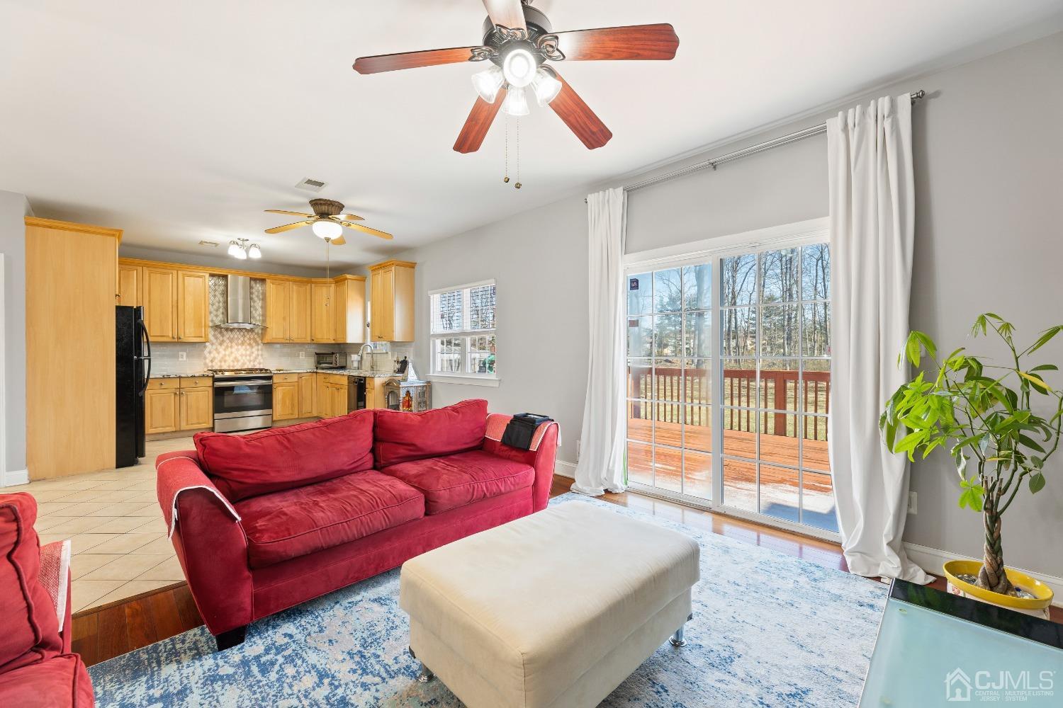747 Magnolia Road North Brunswick, NJ 08902 - Photo 6 of 36 a living room with furniture and a large window