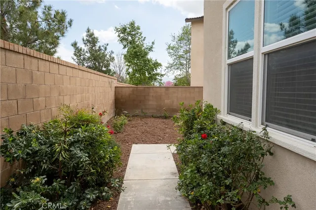 front view of a house with a glass door and a window