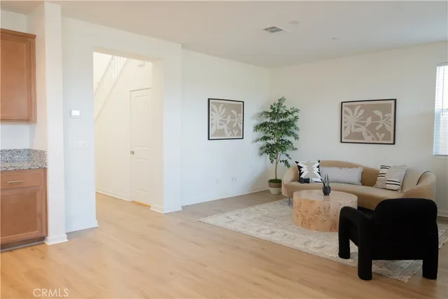 a kitchen with stainless steel appliances granite countertop sink stove and cabinets